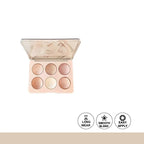 Makeup palette with six circular shades on a white background