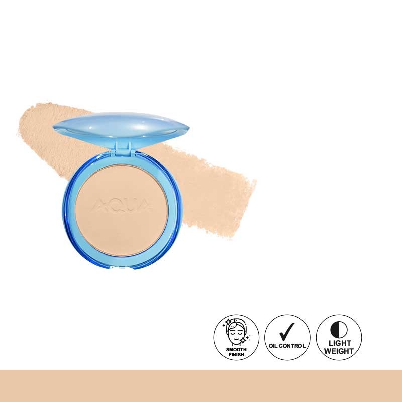 Compact powder with blue casing on a beige background