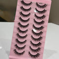 Set of false eyelashes on a pink card with 'BF06' label.