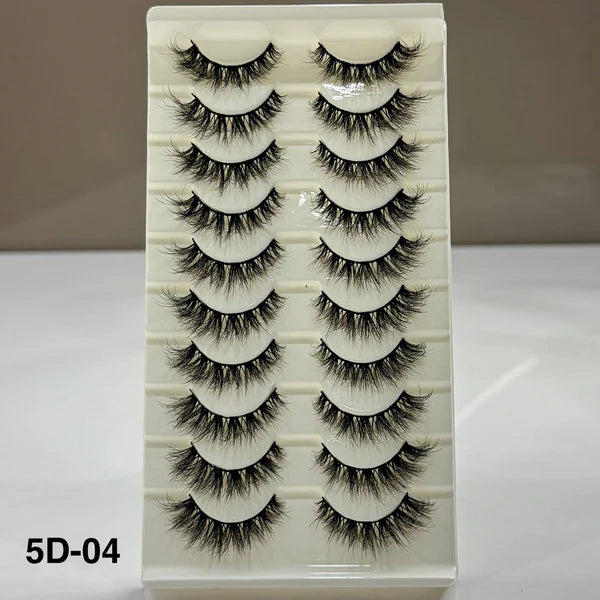 Set of false eyelashes on a display card with a neutral background