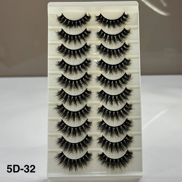 Set of false eyelashes on a display card with a neutral background