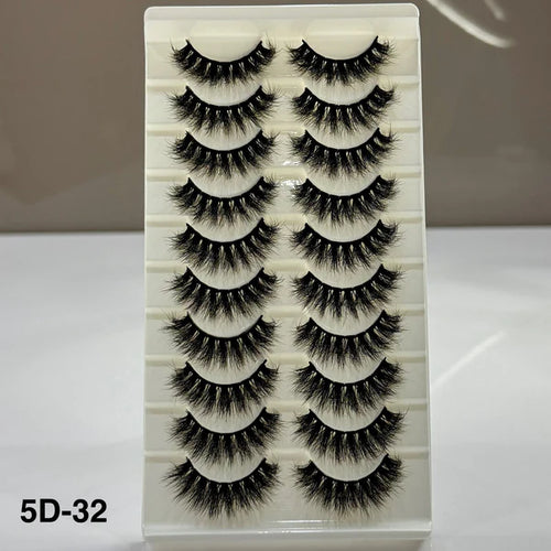 Set of false eyelashes on a display card with a neutral background