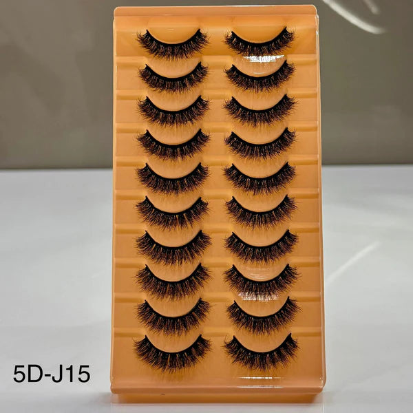 Set of false eyelashes on a wooden display board with '5D-J15' label.