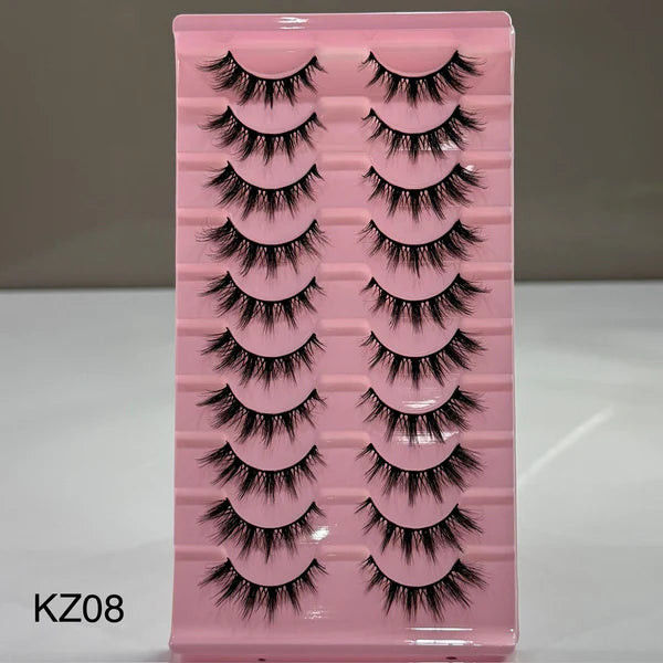 Pink tray with false eyelashes labeled KZ08 on a gray background