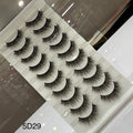 Set of false eyelashes on a branded tray with '5D29' label.
