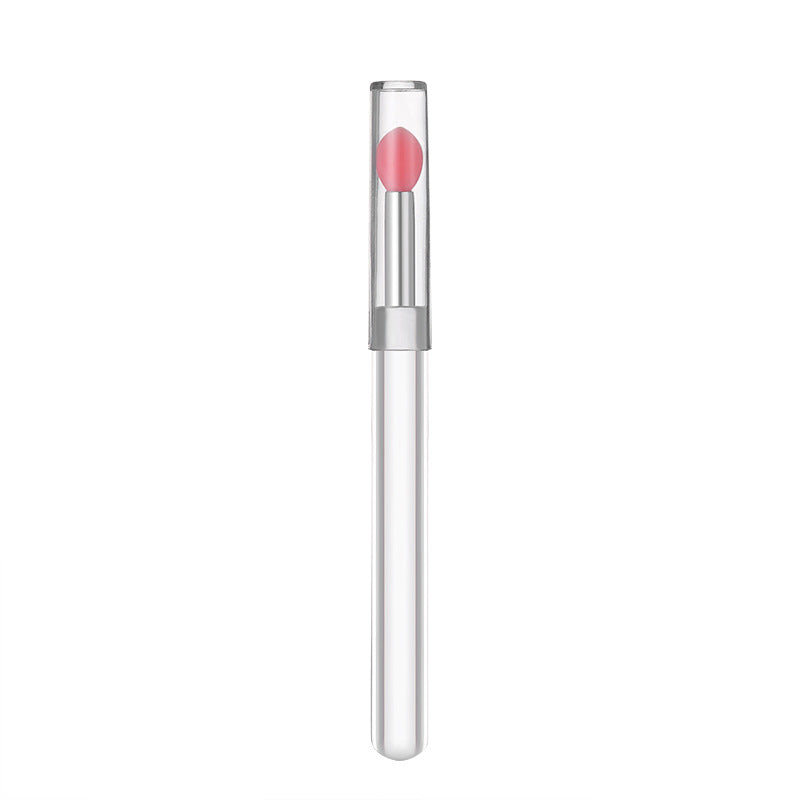 Lip balm with pink shade on a white background