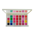 Makeup palette with various colorful shades on a white background