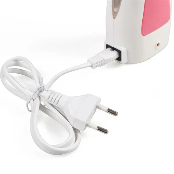 White electric hair clipper with pink accents and power cord on a white background