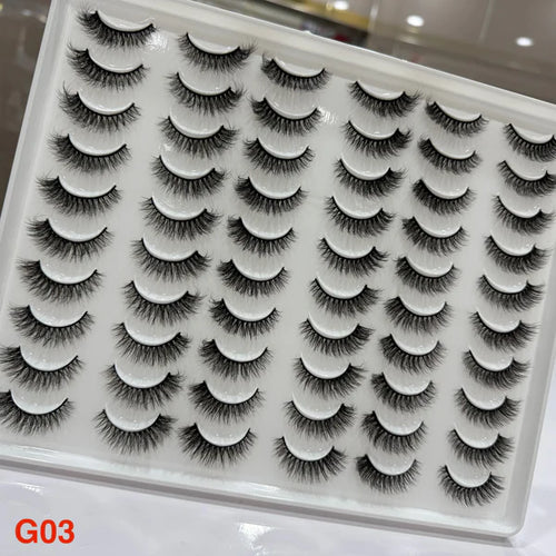 Set of false eyelashes in a white tray with 'G03' label.