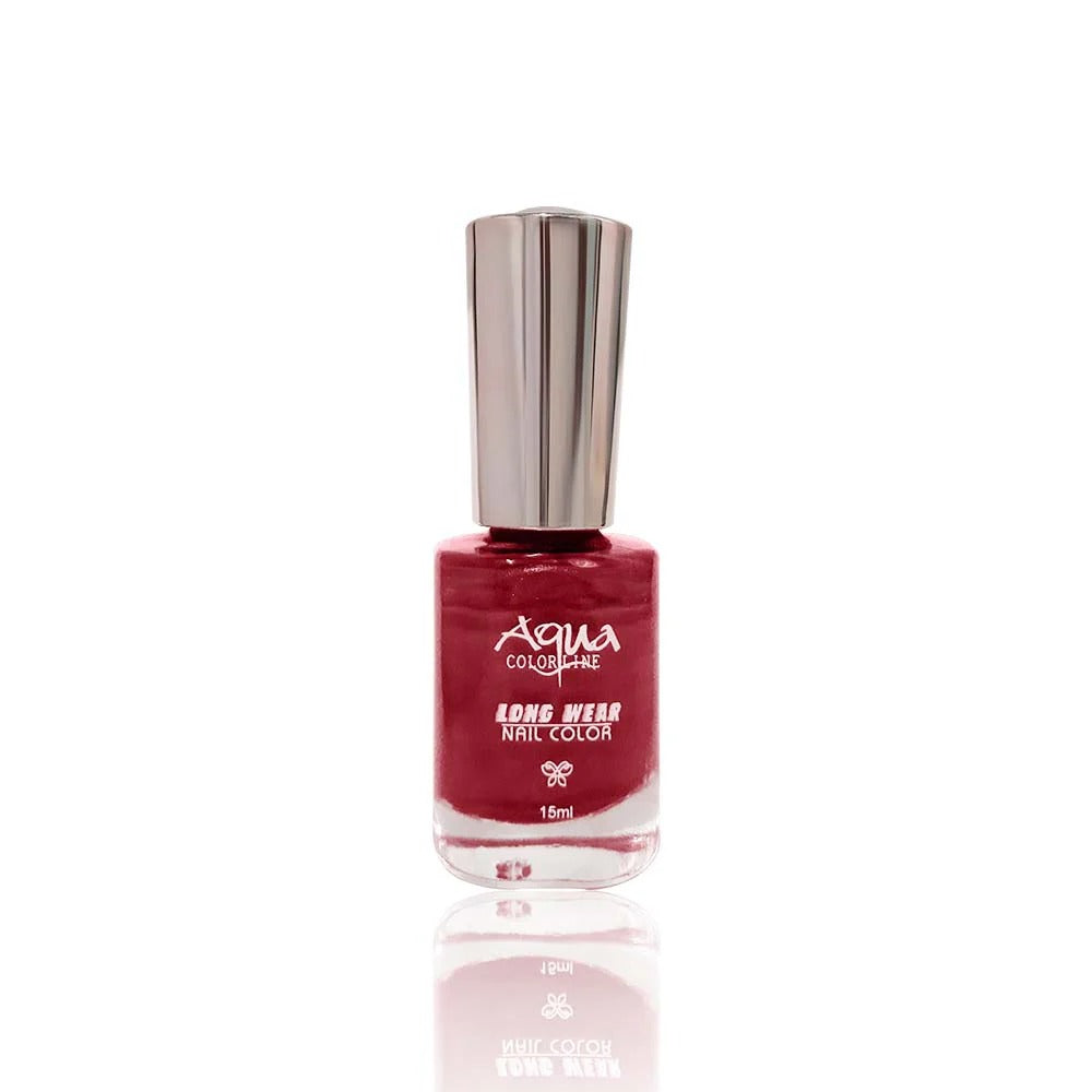 Red nail polish bottle with silver cap on a white background