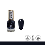 Navy blue nail polish bottle with a matching nail swatch on a white background