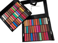 Makeup palette with various colors on a white background