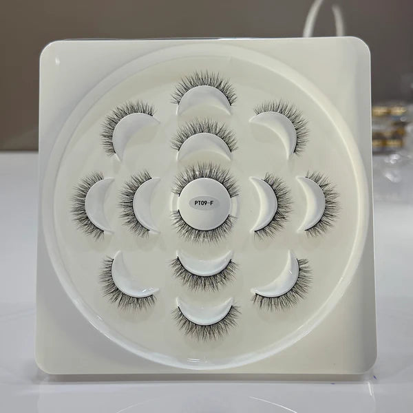 Set of false eyelashes in a white case with a floral design