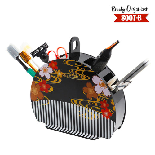 Decorative beauty organizer with floral patterns and various tools on a white background