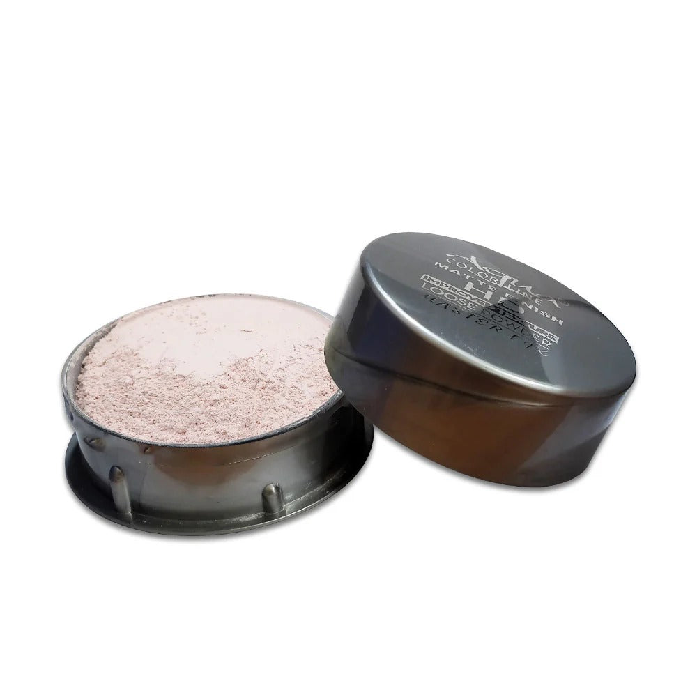Open compact powder with visible brand name on a white background