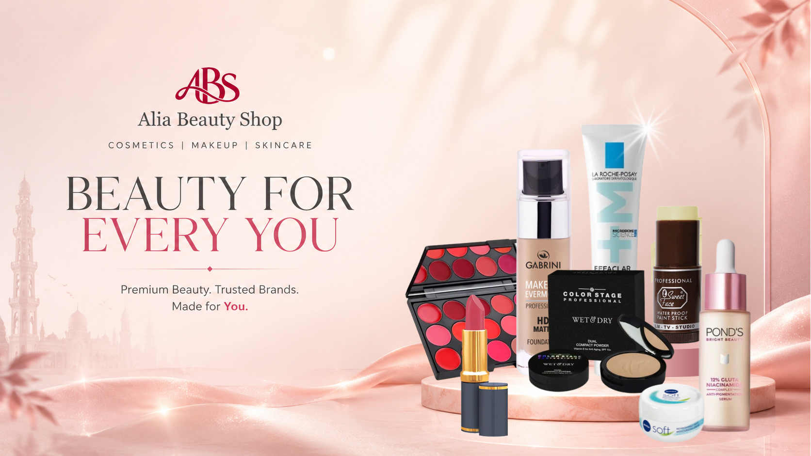 Alia Beauty Shop advertisement with various cosmetic products on a soft pink background