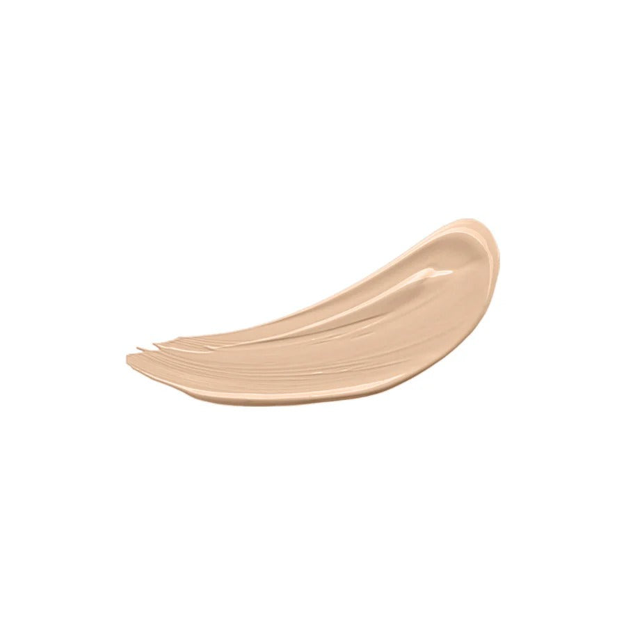Beige cosmetic cream swatch on a white background