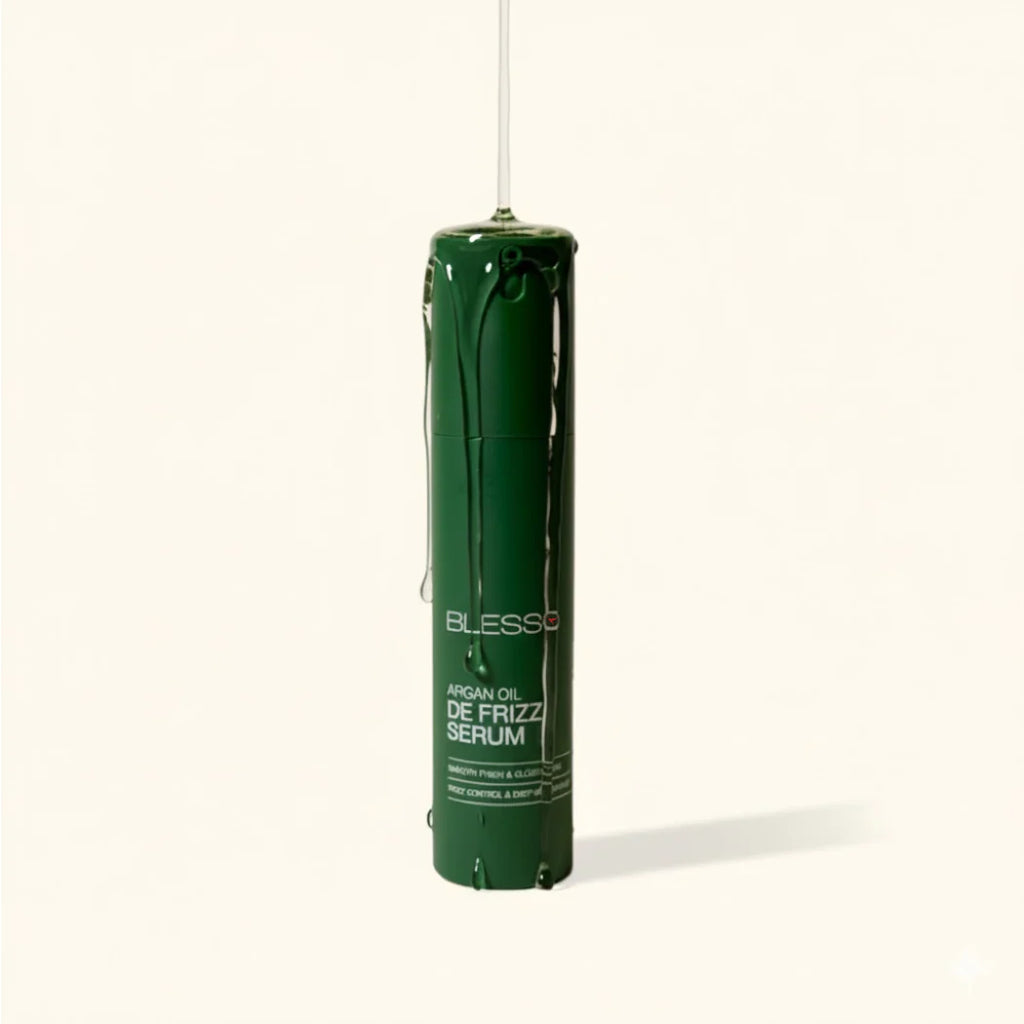 Green serum bottle with 'Blesso' branding on a white background