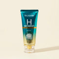 Blesso H Sensation Facial Foam in a metallic teal squeeze tube with a clear cap, set against a solid cream background.