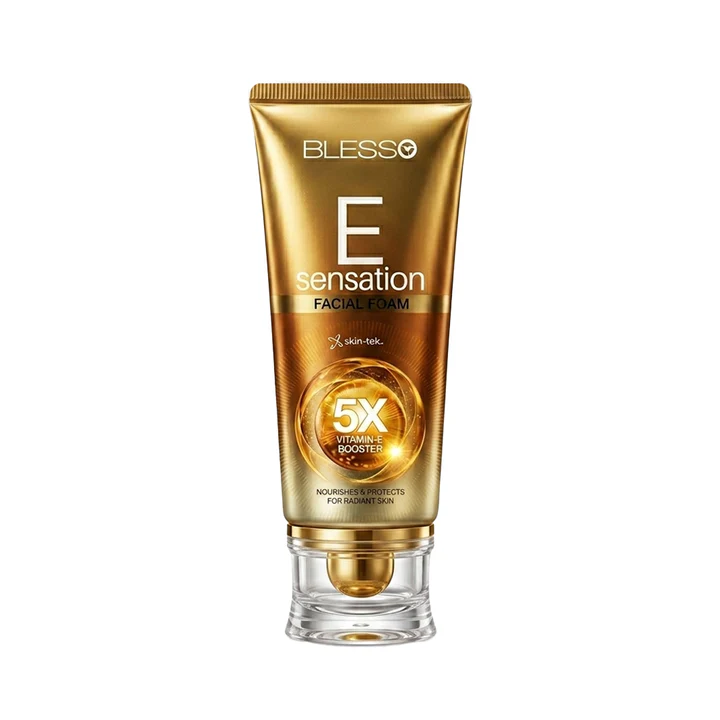 Blesso E Sensation Facial Cream in a metallic gold squeeze tube with a clear cap, shown on a solid white background.