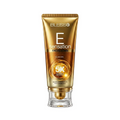 Blesso E Sensation Facial Cream in a metallic gold squeeze tube with a clear cap, shown on a solid white background.