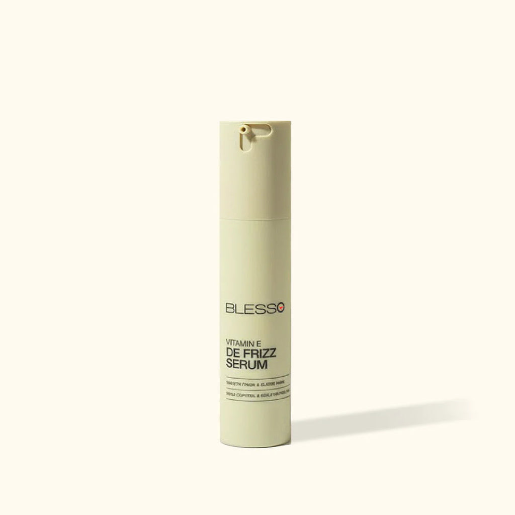 Blesso Vitamin C De Frizz Serum bottle on a white background