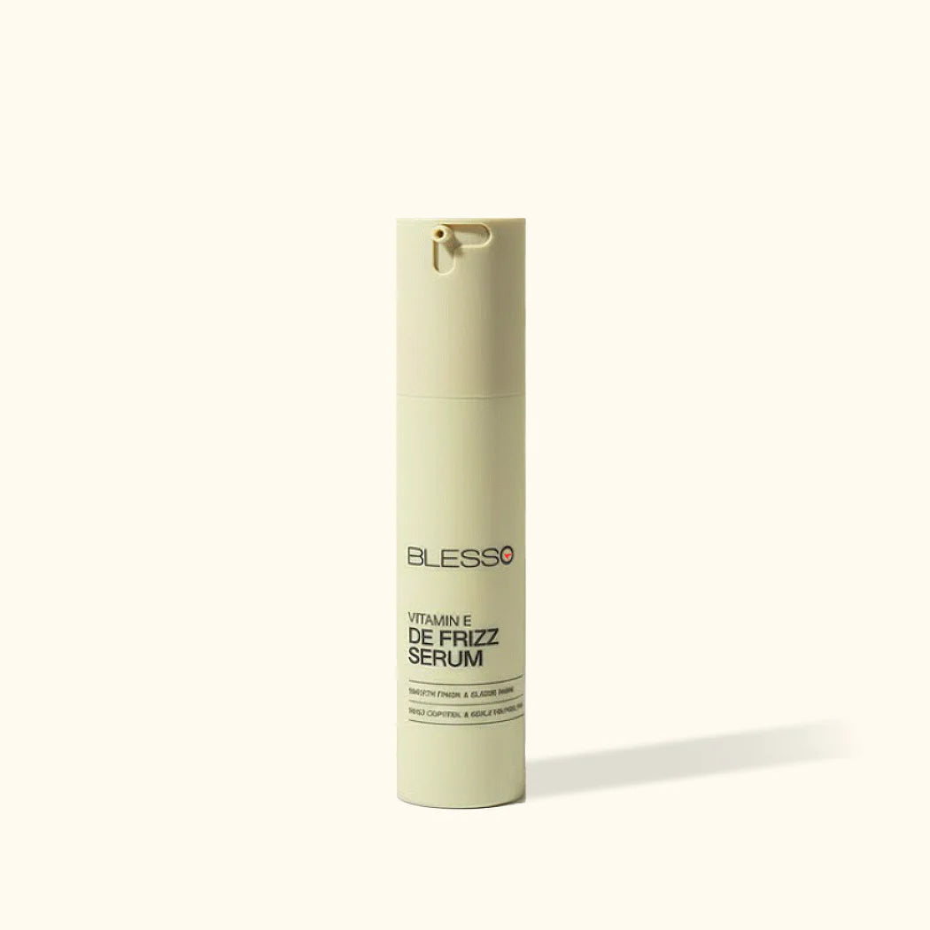 Blesso Vitamin C De Frizz Serum bottle on a white background