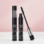 BOB Super Curl Mascara Thick Intense Waterproof with open cap on a white surface against a pink background