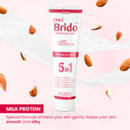 Cinci Brido Whitening Cream tube with almonds on a pink background