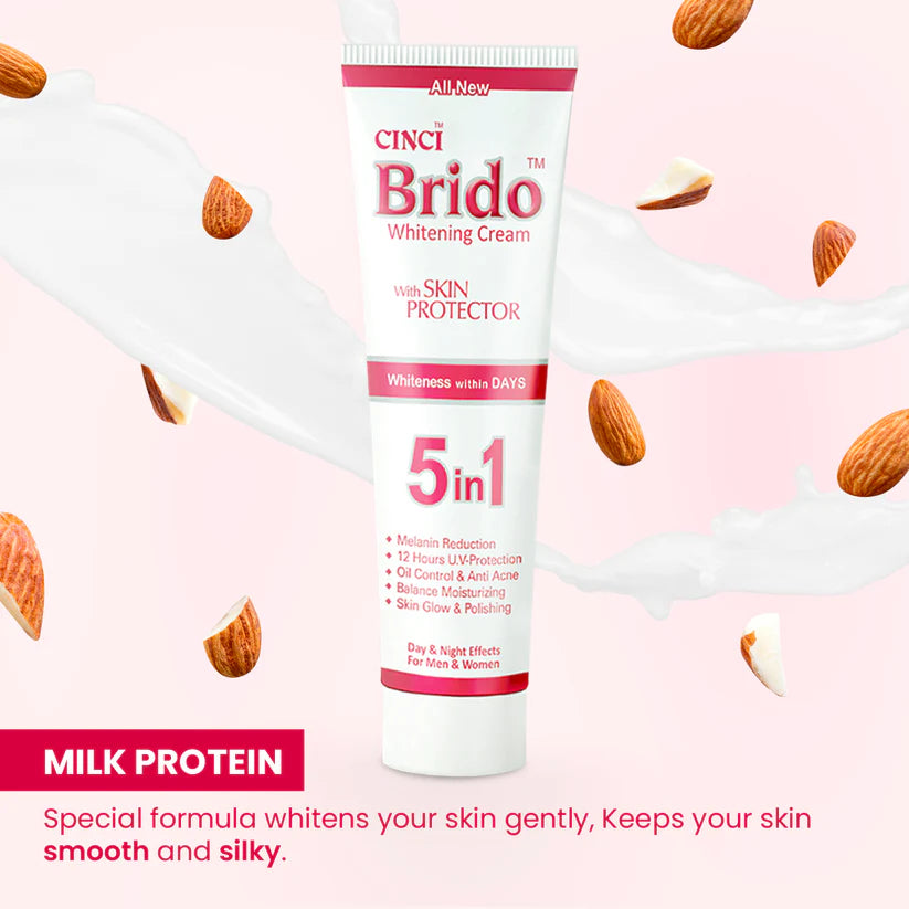 Cinci Brido Whitening Cream tube with almonds on a pink background