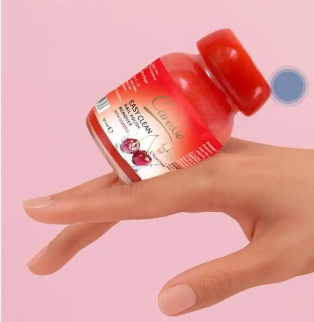Hand holding a red bottle labeled 'Easy Clean' against a pink background