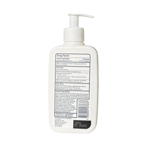 White bottle with pump and label on a white background