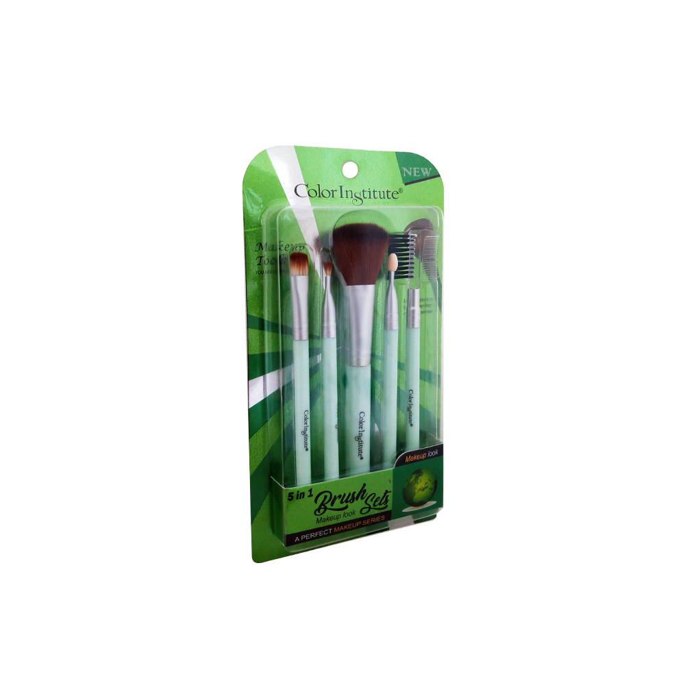 Set of makeup brushes in a green and white packaging on a white background