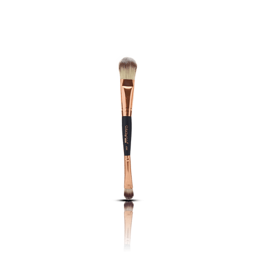 Makeup brush with rose gold handle and black ferrule on a transparent background
