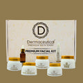 Dermaceutical premium skin care facial kit with various products on a beige background