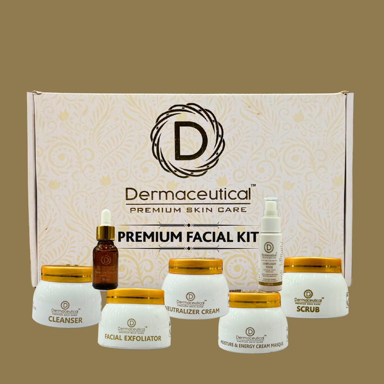 Dermaceutical premium skin care facial kit with various products on a beige background