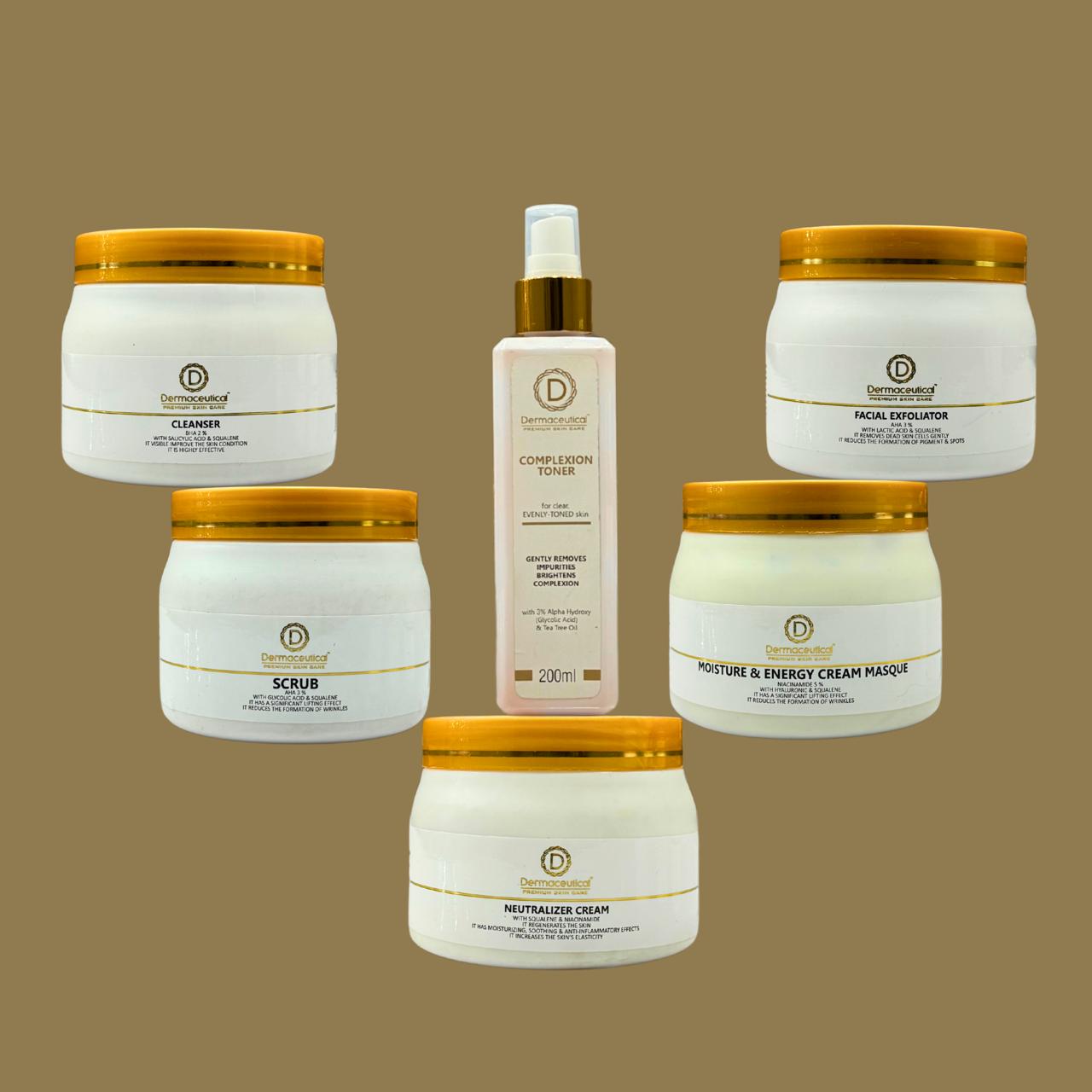 Collection of skincare products with gold lids on a brown background