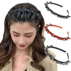 Woman wearing a decorative headband with additional headbands displayed on a white background