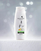 Shampoo bottle labeled 'Fresh & Joy' on a gray background