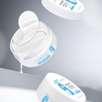 White jar with blue label on a gray background
