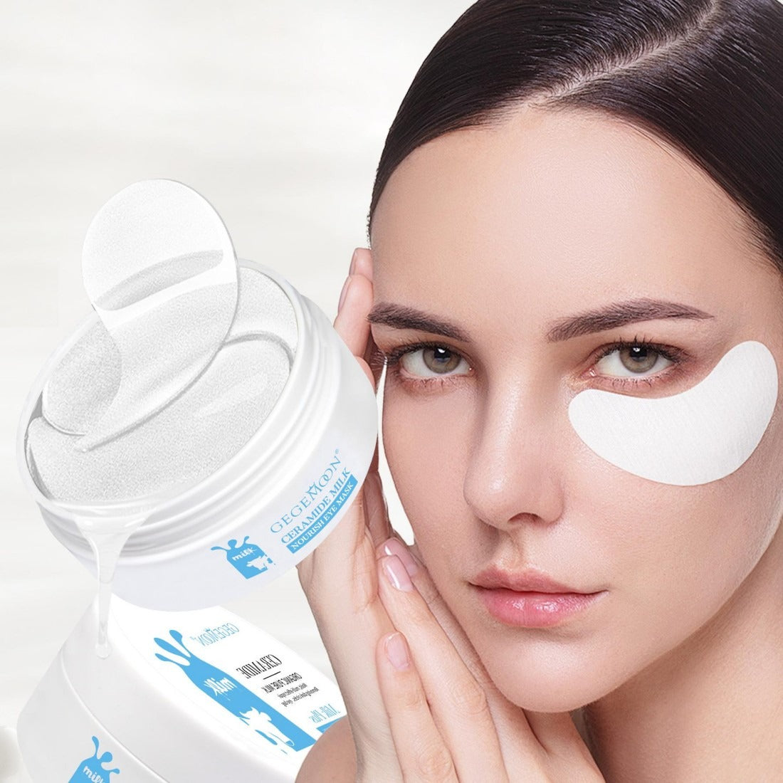 Woman with under-eye patches and a skincare product on a light background