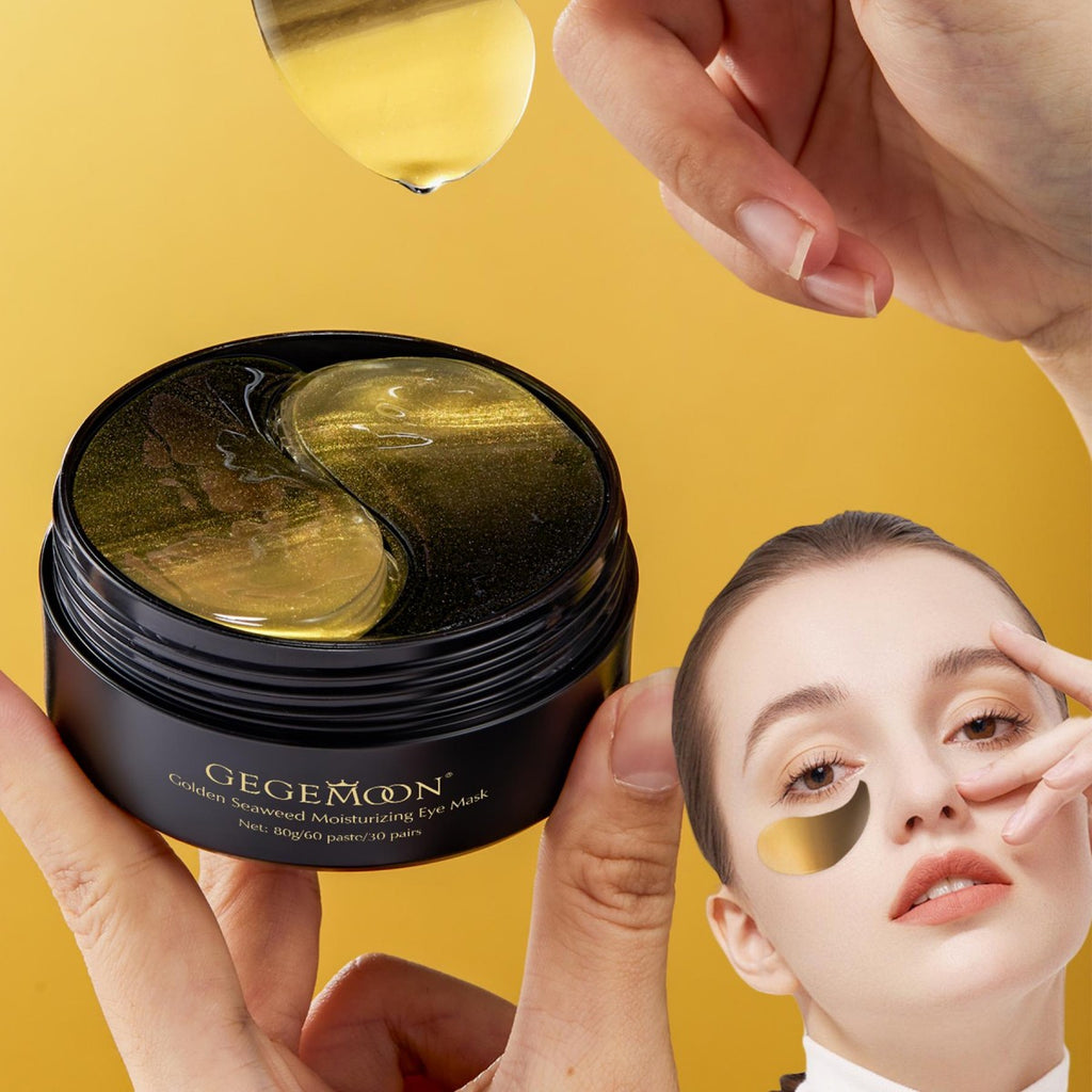 GEGEMON eye mask packaging with a hand applying them to a person's eyes against a yellow background