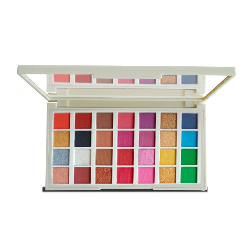 Makeup palette with various colors on a white background