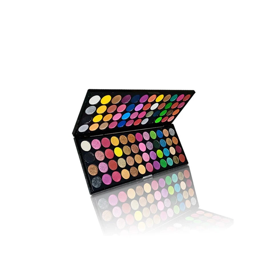 Makeup palette with a variety of colorful shades on a white background