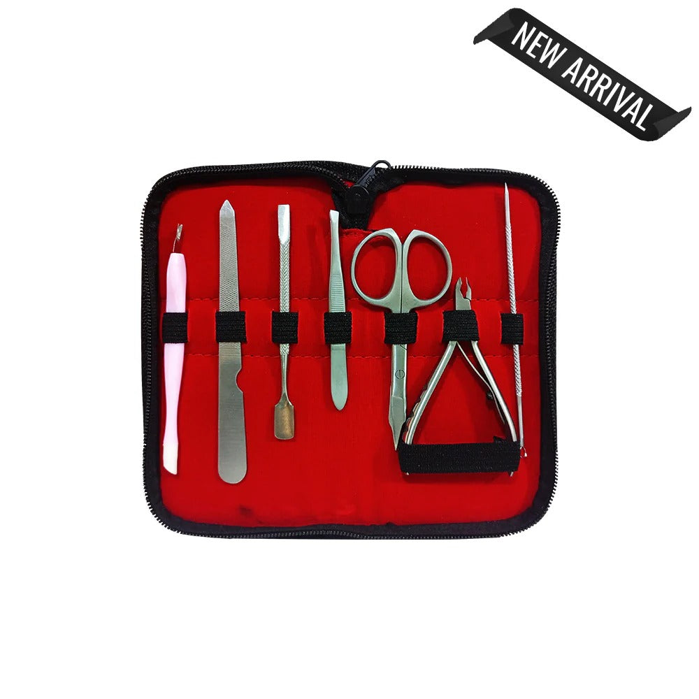 Manicure set with tools in a red case on a white background