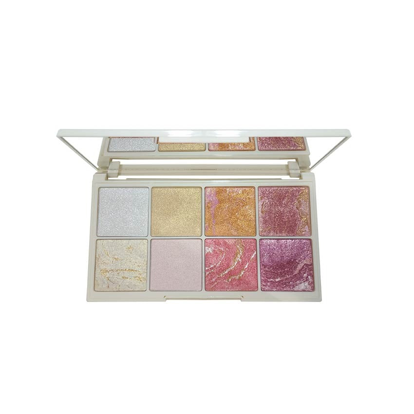 Makeup palette with various glittery shades on a white background