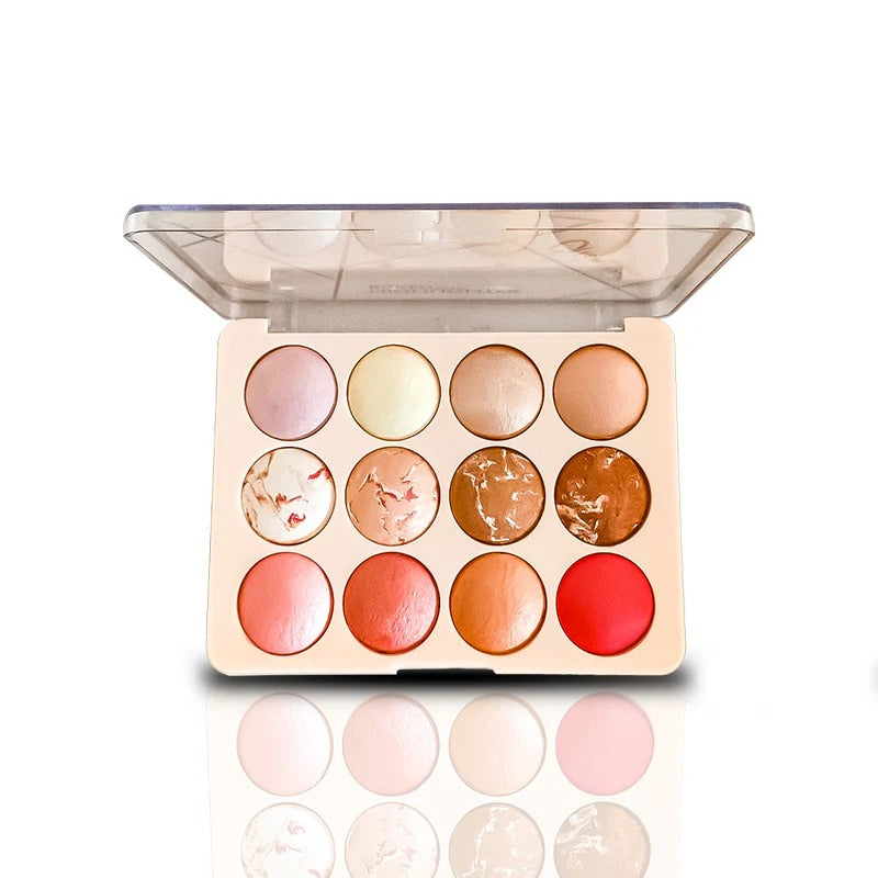 Makeup palette with various colors on a white background