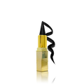 Gold lipstick with black wick on a white background
