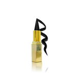 Gold lipstick with black wick on a white background