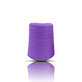 Spool of purple thread on a white background